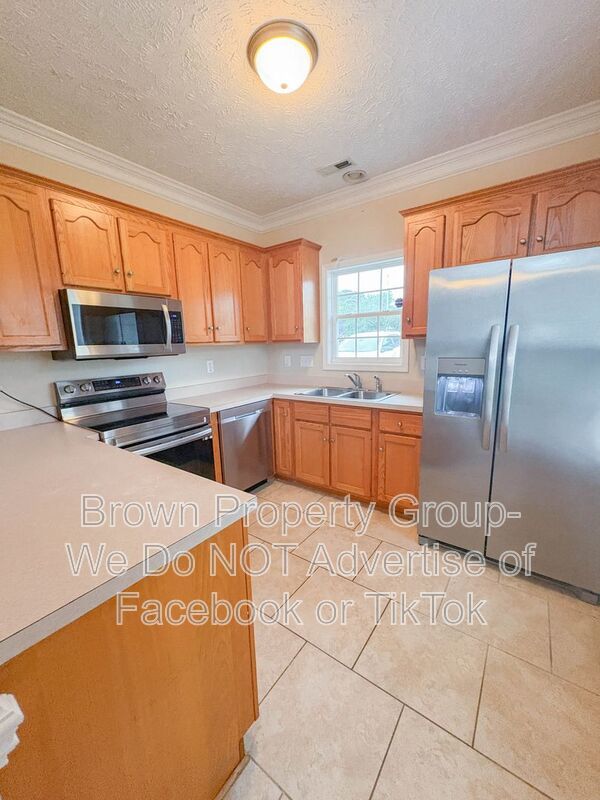 2 Weeks Free on First Full Months Rent~ 3 Bedroom 2.5 Bathroom Townhome~ Large Corner Lot property image